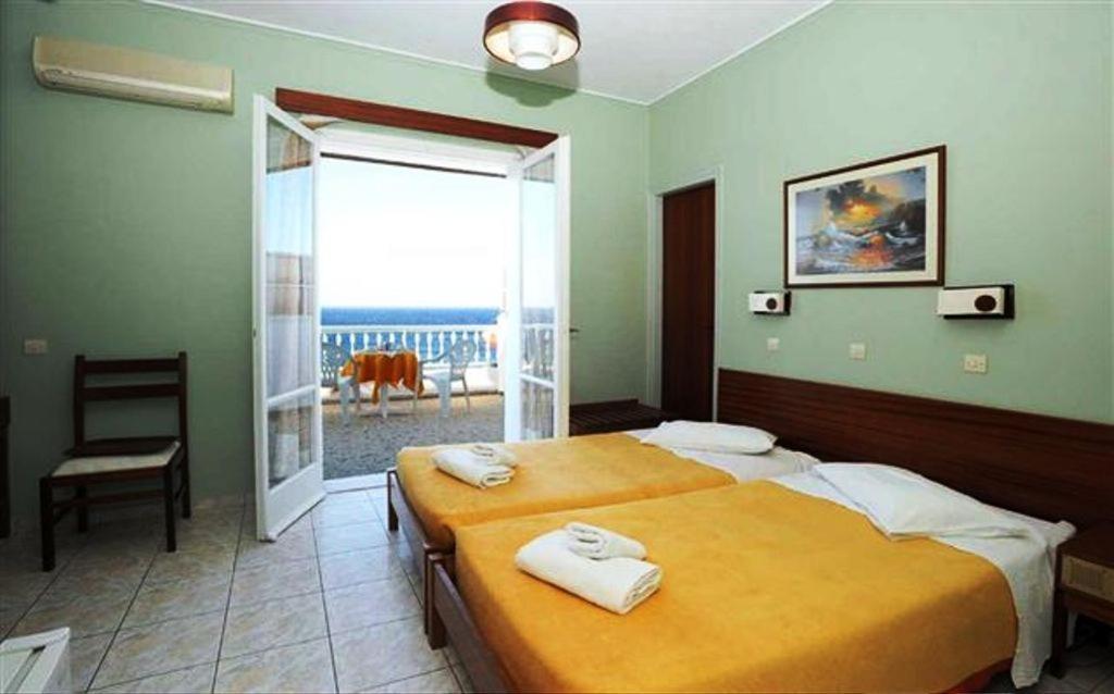 Asteria Hotell Tínos Rum bild