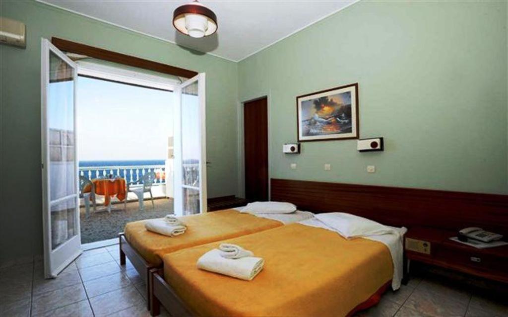 Asteria Hotell Tínos Rum bild